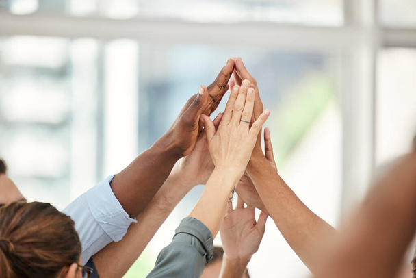 Hands, high five and business people, team and success in meeting for team building, support and trust at company. Diversity in business, collaboration and solidarity between workers and win - Foto, Imagen