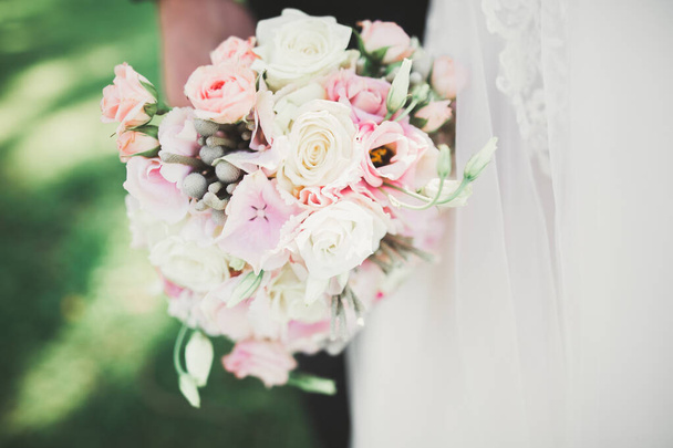 Beautiful wedding bouquet with different flowers, roses. - Foto, Imagen