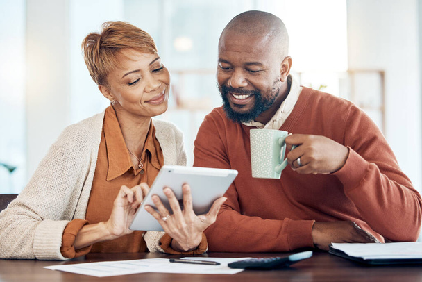 Finance, tablet and black couple doing online banking in home to check bank statement, account and payment. Budget, accounting and middle aged man and woman with documents, paperwork and digital tech. - Photo, image