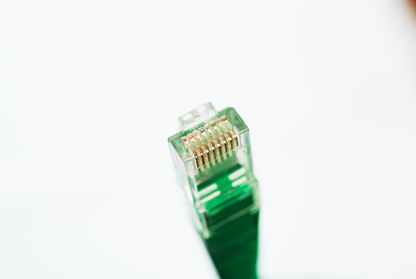 Network Cable RJ45 Head на белом фоне
 - Фото, изображение