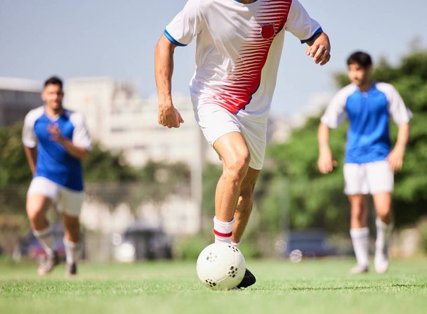 Soccer, team and football sport athlete in a exercise, training and game with running and teamwork. Outdoor field with soccer player busy with fitness, workout and ball sports cardio on soccer field. - Foto, afbeelding