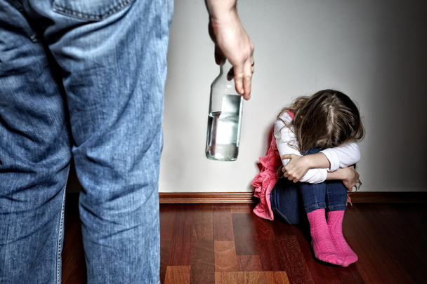 Father with belt stands above the frightened daughter - Foto, Bild