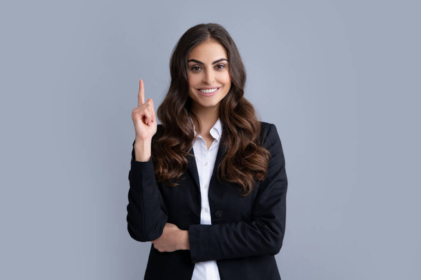 Portrait of young woman pointing her finger in eureka sign, having great innovative idea, solution just got. Positive thinking. Female business model face - Photo, Image