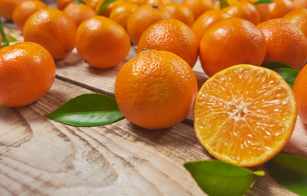 Tangerines on a wooden background - Zdjęcie, obraz