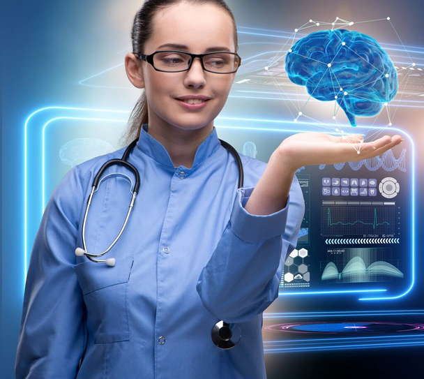 The female doctor with the brain in medical concept - Photo, Image