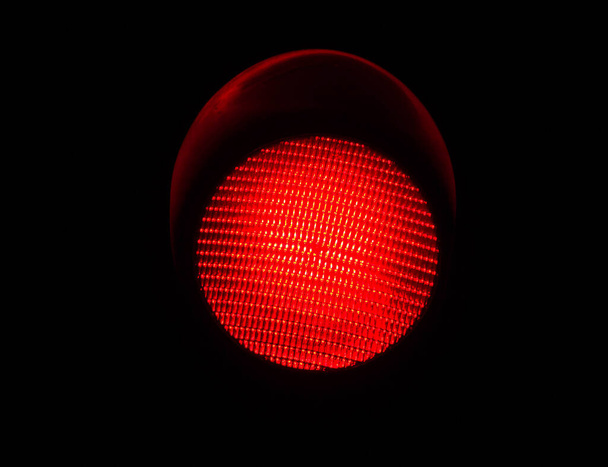 LED Red Light Traffic Light Isolated by a Black Background - Photo, Image