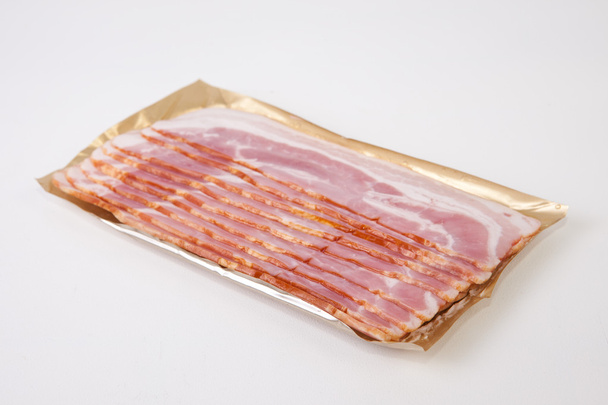 Tranches de bacon sur l'emballage
 - Photo, image