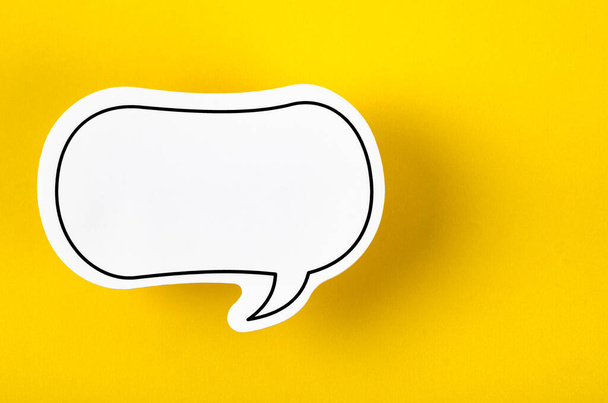 Speech bubble with copy space communication talking speaking concepts on yellow background. - Φωτογραφία, εικόνα