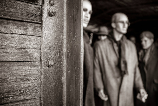 A zsidók elmosódott képe a második világháború náci időszakában a koncentrációs táborokba tartó vonat vagonjain belül - Az emlékezet fogalma, shoah, holokauszt, a zsidók deportálása - Fotó, kép
