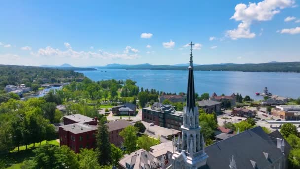 Saint Patrice Church aerial view at 115 Rue Merry N in historic downtown of Magog, Memphremagog County, Quebec QC, Canada.  - Filmagem, Vídeo