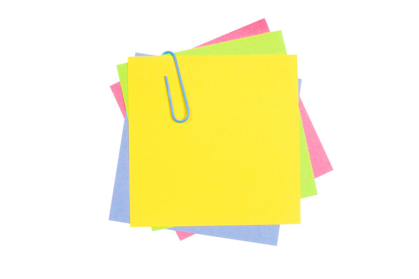 Colour paper with a paper clip - Фото, изображение