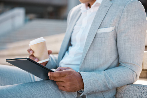 Black man, business and tablet with coffee for marketing strategy, planning sale growth or social media outdoor. Male, digital device for analytics or entrepreneur relax or browse online for research. - Фото, зображення