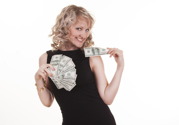 Young woman holding dollars - Valokuva, kuva