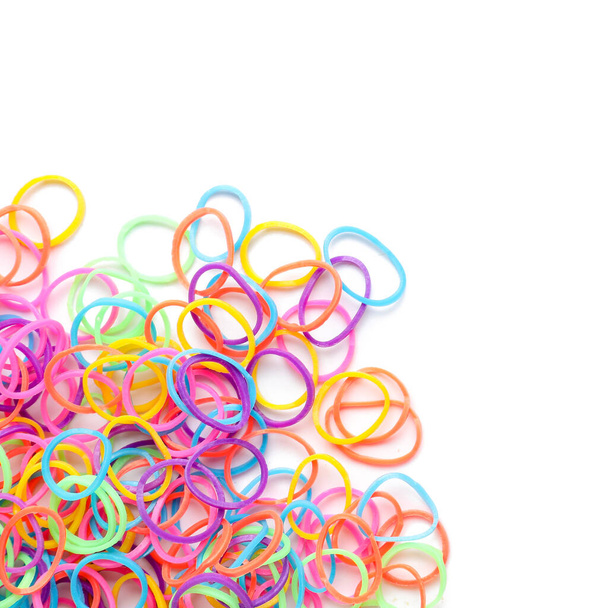Heap of office colorful rubber bands isolated on white background - Photo, Image