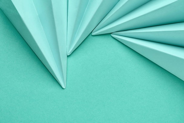 Paper planes on mint background, closeup - Foto, afbeelding