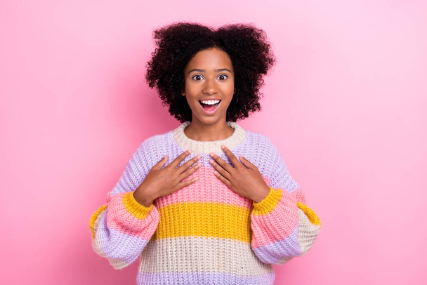Portrait of positive cheerful girl with wavy hairstyle dressed knit pullover hands on chest staring isolated on pink color background. - Fotografie, Obrázek