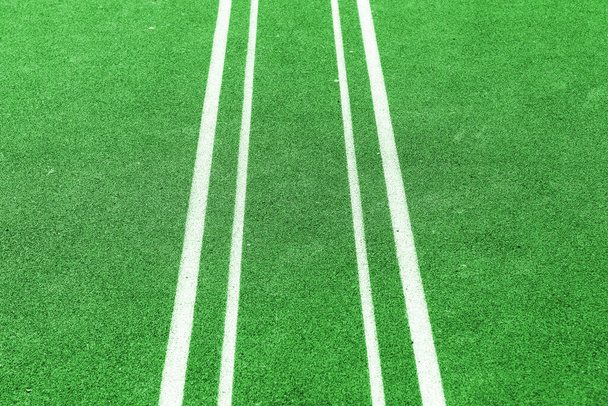 Green field ground with white lines. Outdoor - Φωτογραφία, εικόνα