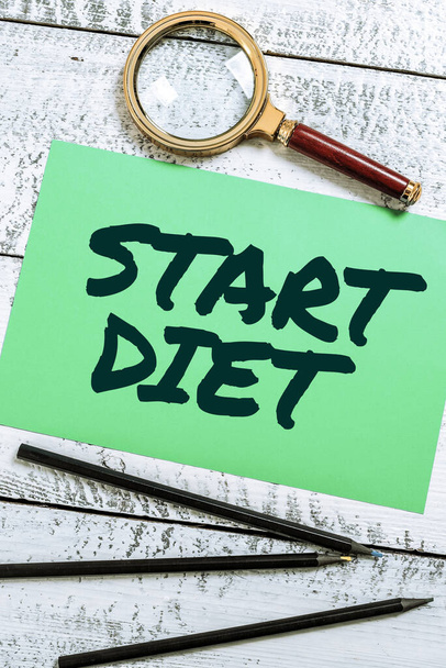 Handschrift Start Diet, Business concept de praktijk van het eten van voedsel op een gereguleerde en gecontroleerde manier - Foto, afbeelding