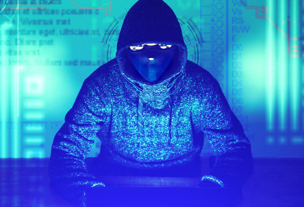 Man in hoodie is hacking personal data. Information security. Protection of information concept. Bad password. - Фото, зображення