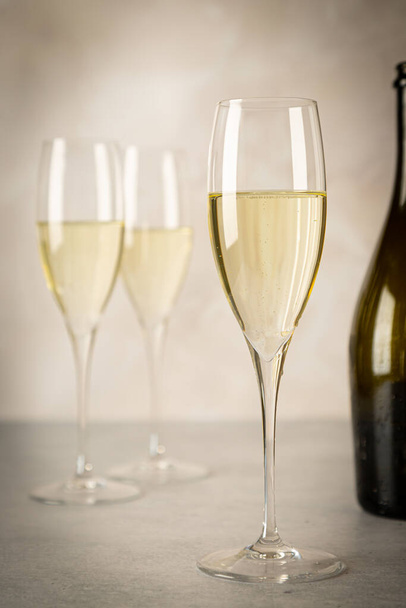 Festive photo of sparkling wine in glasses - Φωτογραφία, εικόνα