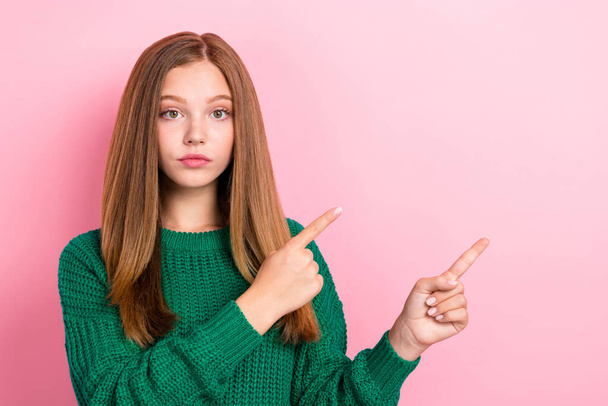 Closeup photo of young serious unhappy woman brown hair fingers pointing empty space attention tips information isolated on pink color background. - Fotoğraf, Görsel