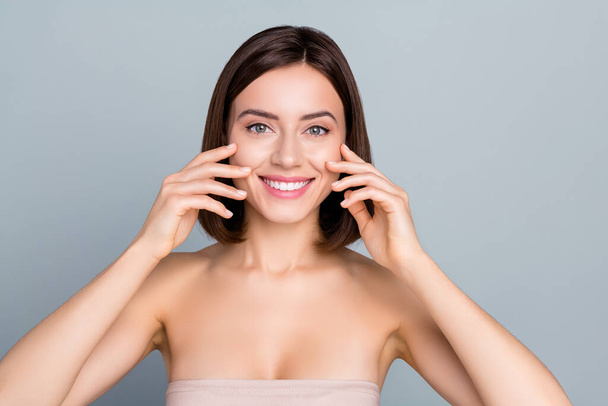 Portrait of positive joyful lady touch hands cheeks enjoy cleansing complexion collagen treatment isolated over grey color background. - Fotografie, Obrázek