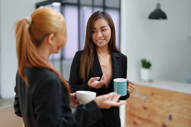 Portrait of an Asian businesswoman consulting, start up a marketing plan to meet the needs of customers in office room - 写真・画像