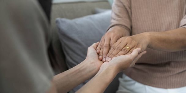 people, age, family, care and support concept - close up of senior and young woman holding hands. - Photo, Image