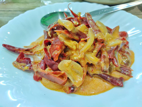 Comida butanesa - Ema Datshi (curry de queso chile rojo) en Bangkok, Tailandia - Foto, Imagen