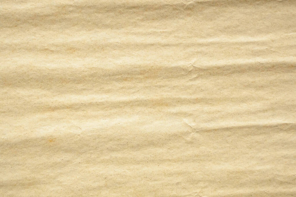 Old crumpled brown vintage paper texture background - Foto, imagen