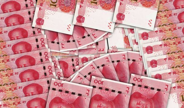 Chinese yuan Renminbi banknotes in a cash fan mosaic pattern. China 100 RMB notes. Abstract concept of bank, finance, economy decorative design background 3d illustration. - Photo, Image