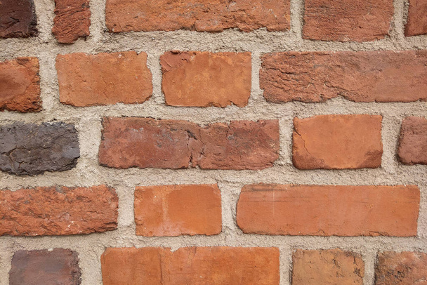 Uma parede de tijolo estruturada de uma casa ou edifício. Contexto - Foto, Imagem
