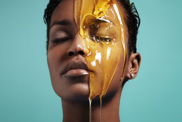Woman with honey on face - Photo, Image