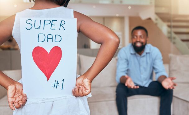 Fathers day, black man and girl with card for celebrating special event with father and daughter. Family, love and kid with dad to celebrate loving care with heart gift note at home for happy day. - Foto, Bild