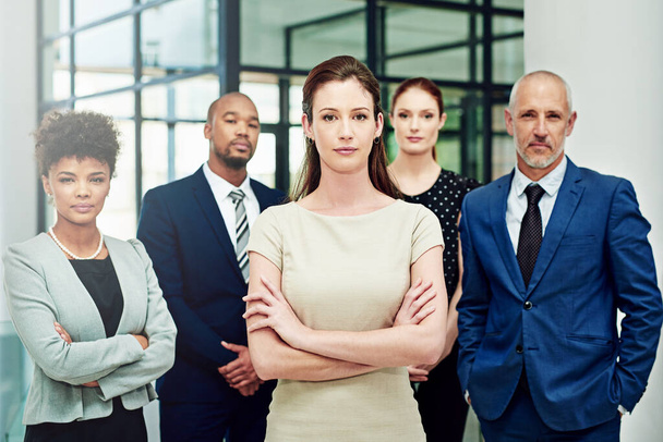 They take their work ethic seriously. Cropped portrait of a diverse group of businesspeople standing with their arms crossed in their office - Photo, Image