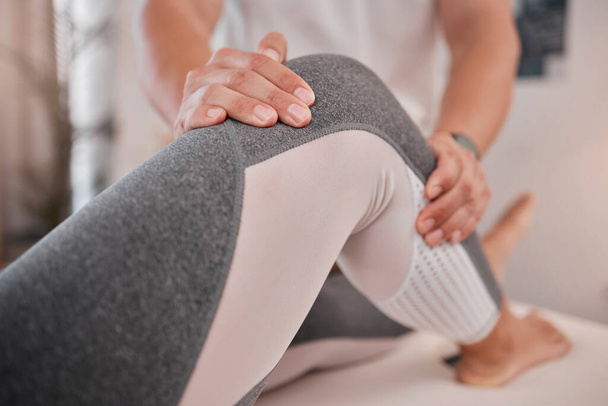 Physiotherapy, knee pain or woman with therapist for medical healthcare, leg injury or wellness massage for help. Medicine, physical therapy or health worker consulting, support or helping patient. - Photo, Image