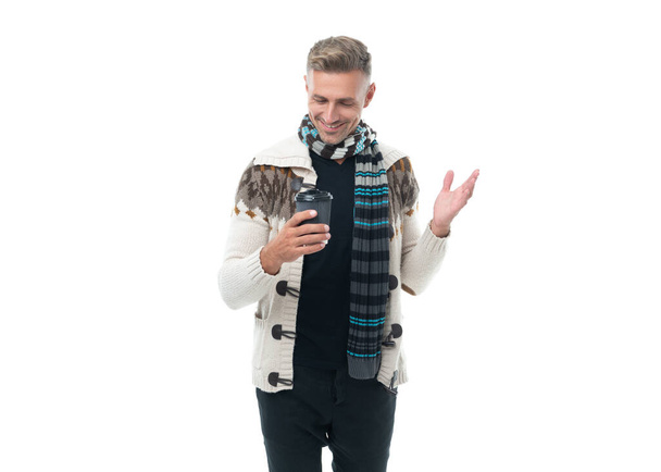 happy man hold coffee cup in studio. man holding morning coffee for holiday. mature man in sweater with coffee. mature man with coffee isolated on white background. - Zdjęcie, obraz