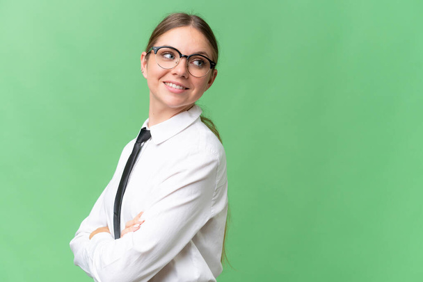 Young business caucasian woman over isolated background with arms crossed and happy - Foto, immagini