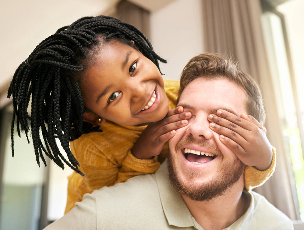 Adopted child, man or father bonding in fun game in house living room, hotel or family home in hide and seek activity, love and trust. Portrait, smile or playful black girl with foster support parent. - Valokuva, kuva