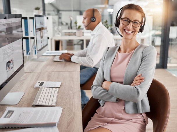 Call center, CRM or happy consultant woman in office with smile for contact us, leadership or success customer support help. Customer service smile, telemarketing or sales advisor communication. - Valokuva, kuva