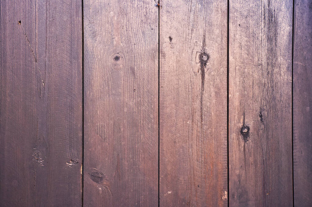 Natural wood background texture with wood grain pattern, knots and cracks in narrow boards.  - Photo, Image