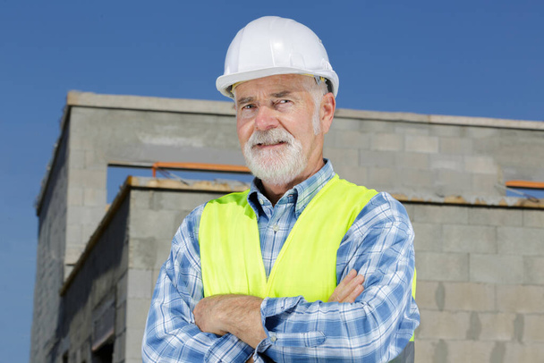 senior architect manager in front of construction site - Foto, Imagem