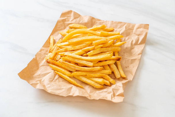 French fries or potato chips with sour cream and ketchup - Photo, image