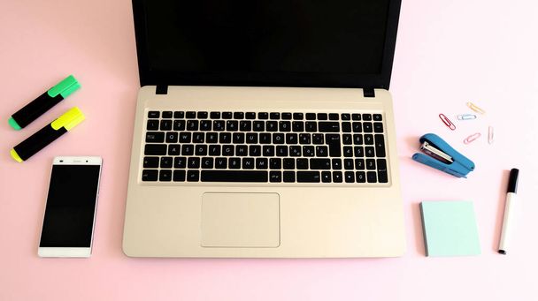 Stylish workspace with laptop computer, smartphone and modern office accessories - Φωτογραφία, εικόνα