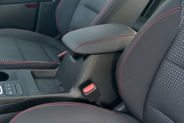 Armrest in the luxury passenger car between the front seats - Photo, Image