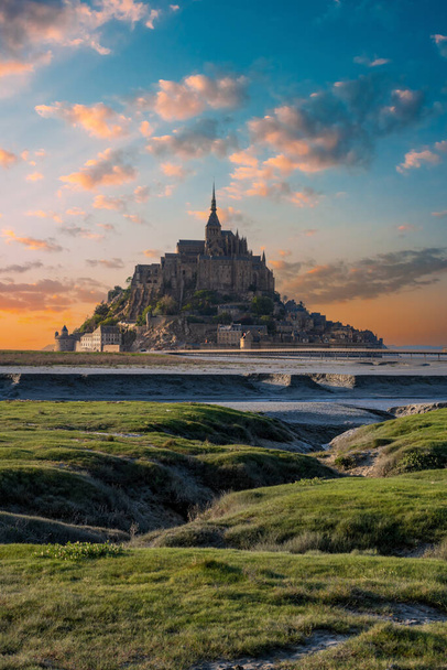 Michael the Archangel on Mont Saint-Michel - a former male Benedictine monastery on the Mont Saint-Michel hill in Normandy, northern France. - Photo, Image