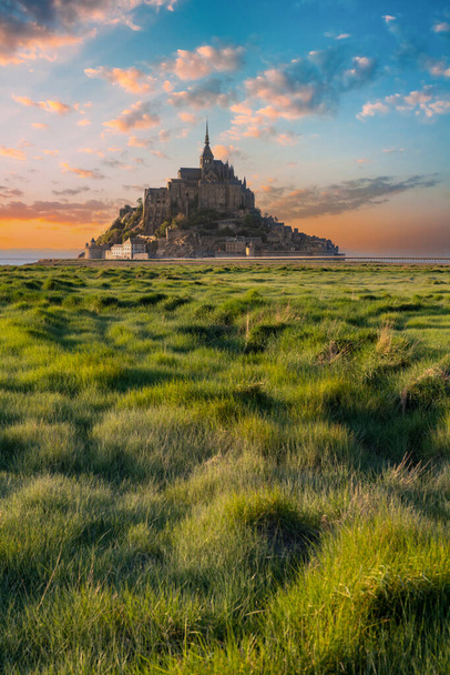Michael the Archangel on Mont Saint-Michel - a former male Benedictine monastery on the Mont Saint-Michel hill in Normandy, northern France. - Photo, Image