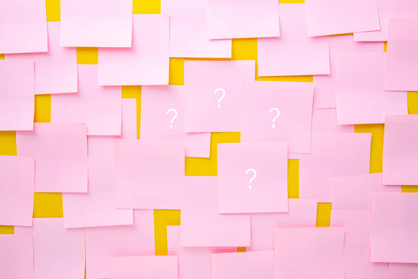 Uncertainty or doubt concept. Sticky notes with question marks.  - Photo, Image