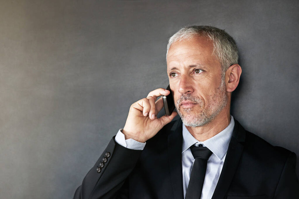 What it means to be white collar. a handsome mature businessman in corporate attire - Fotoğraf, Görsel
