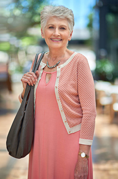Theres nothing like a little shopping to get me smiling. Cropped portrait of a senior woman out on a shopping spree - Photo, Image